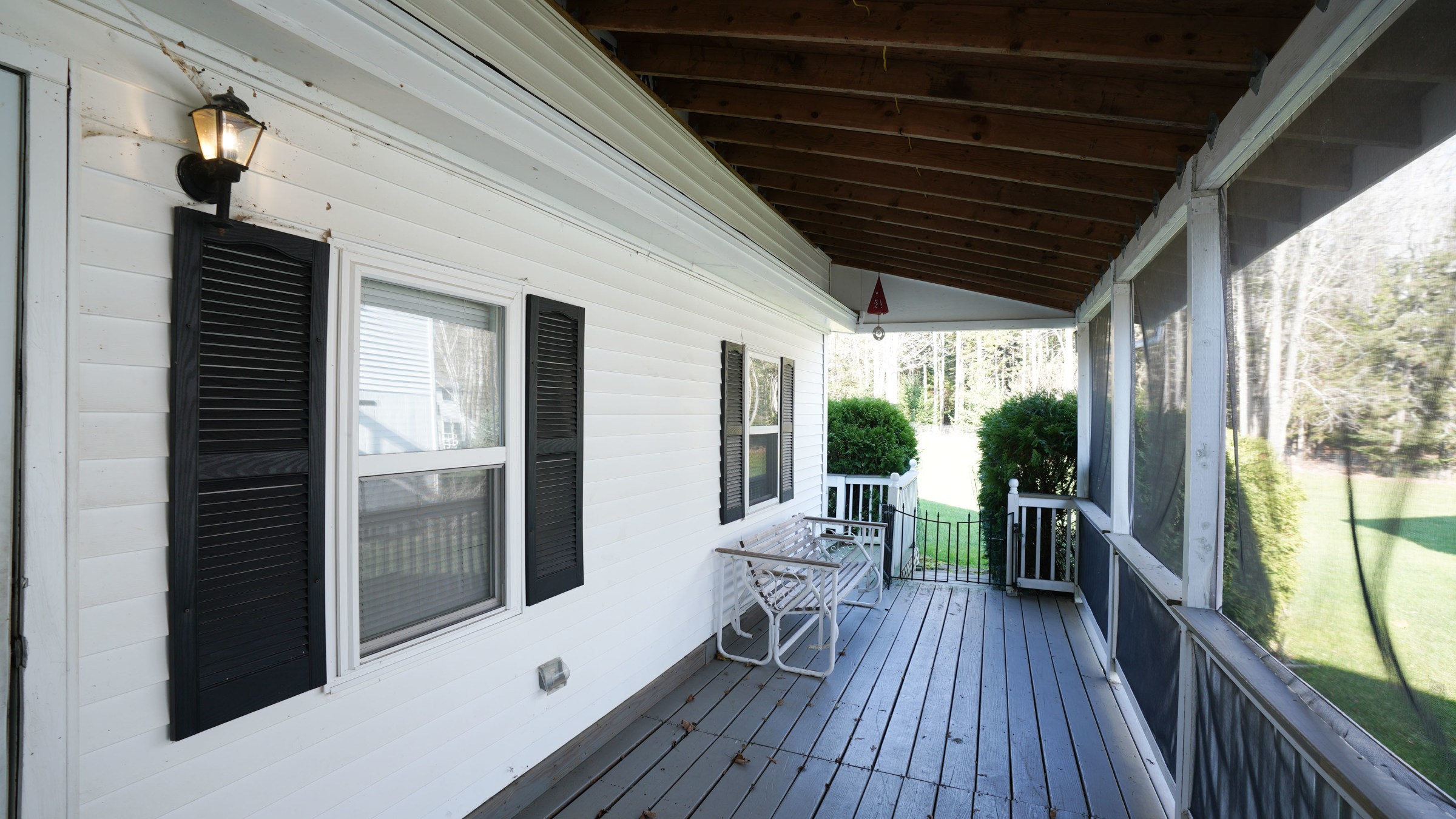 a room with a wooden fence