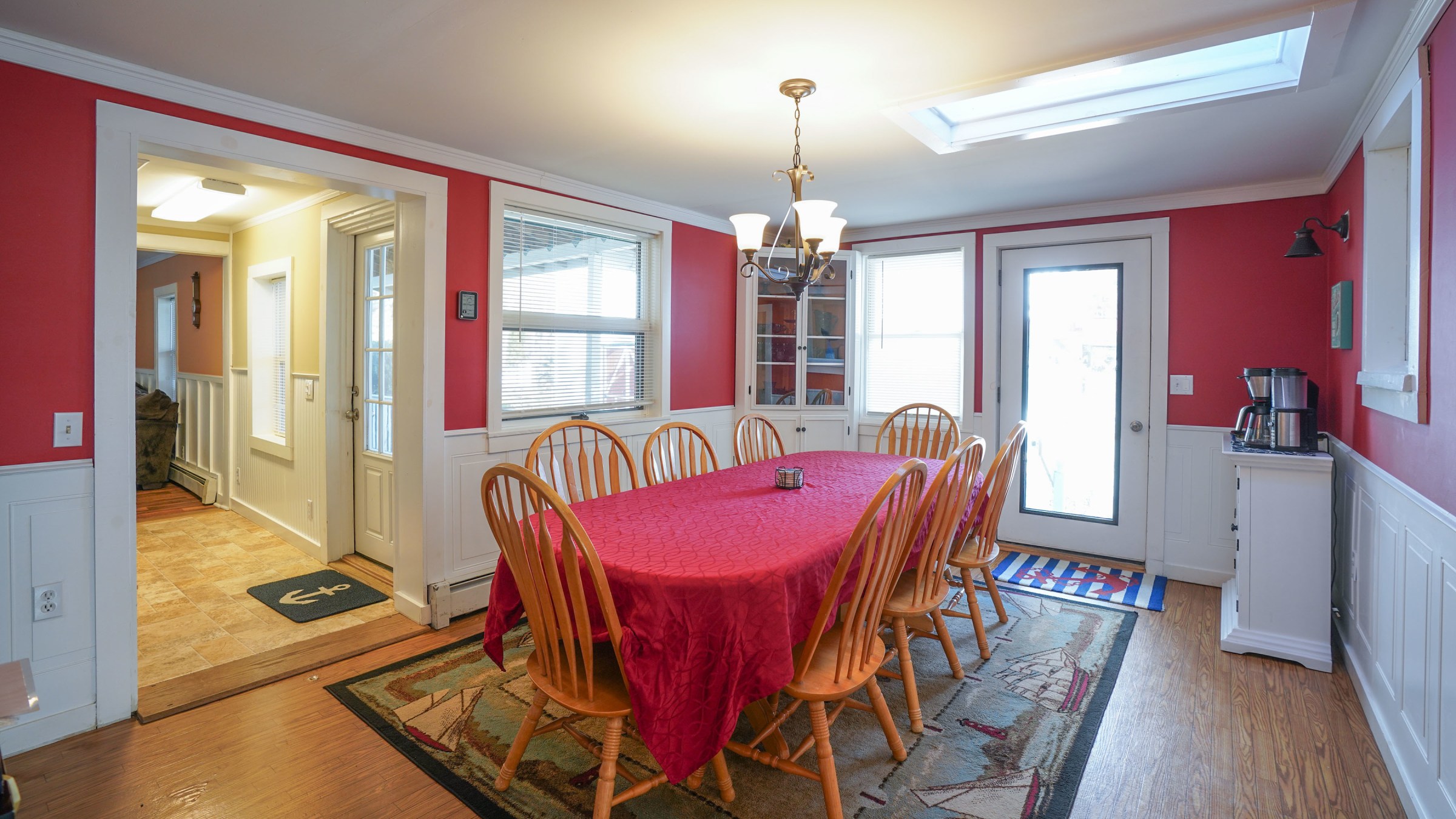 a kitchen with a dining room table