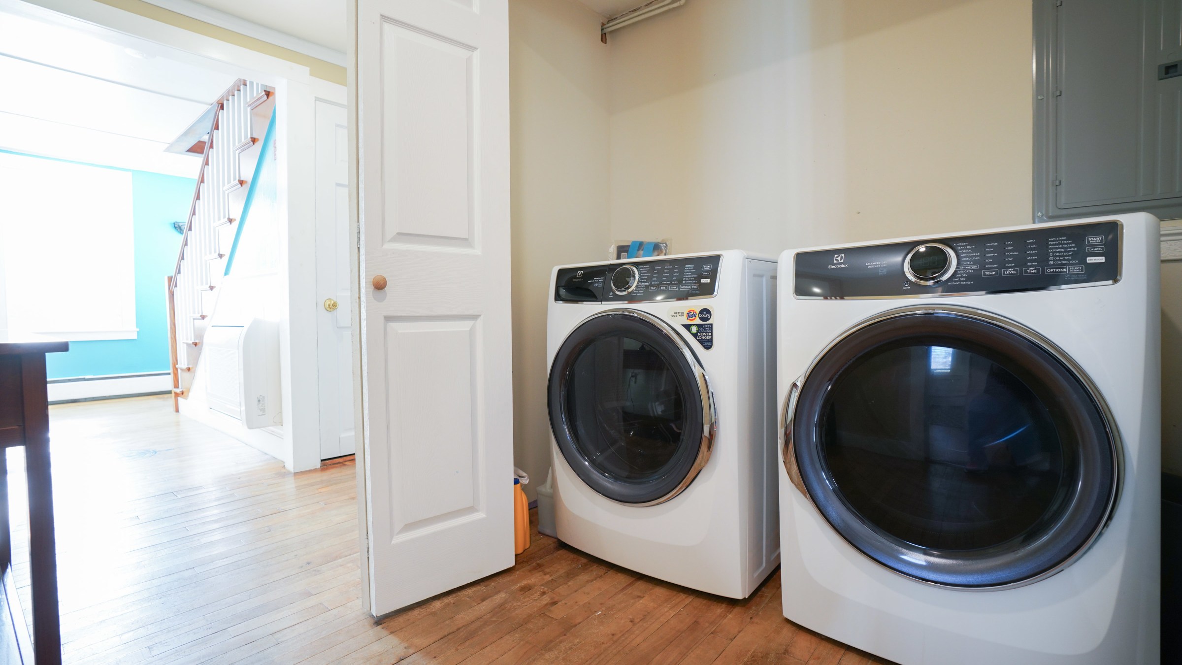 a microwave oven above a refrigerator