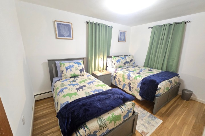 a bedroom with a bed in a room