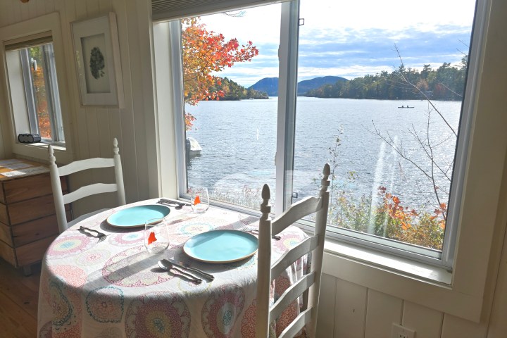 a view of a bedroom next to a window