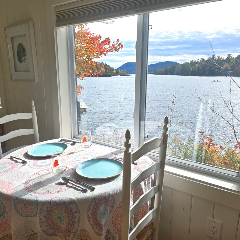 a view of a bedroom next to a window