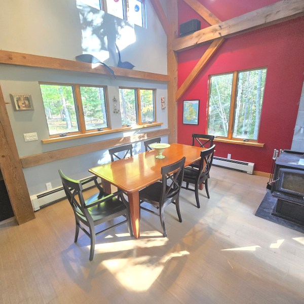 a dining room table in front of a building