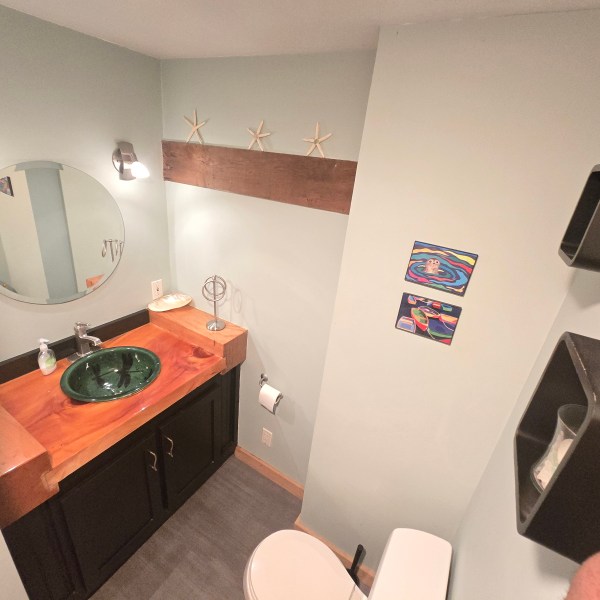 a close up of a sink in a small room