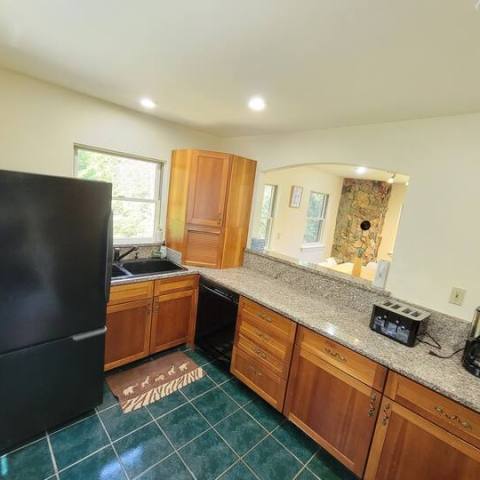 a modern kitchen with stainless steel appliances