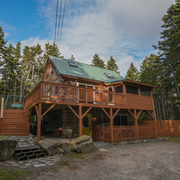 a house with trees in the background