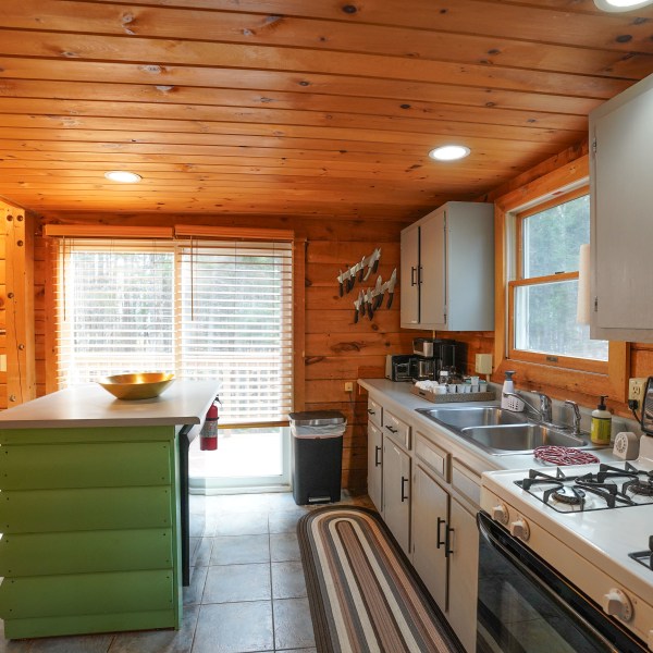 a kitchen with a table in a room